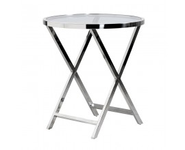 Moderní chromový kulatý příruční stolek Cromia se stříbrnou kovovou konstrukcí s překříženými nožičkami a skleněnou vrchní deskou