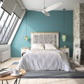 Luxusní čalouněná postel Rodas s čalouněným textilním rámem a čelem z masivního dřeva v bílé barvě