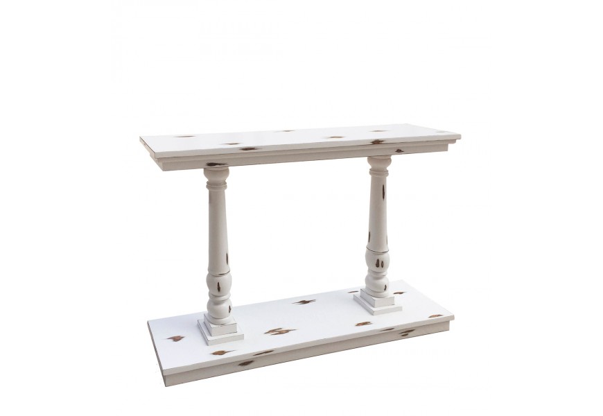 Vintage klasický konzolový stolek Bianca s bílým starožitným záměrně sešoupaným nátěrem z masivního mindi dřeva se dvěma ozdobně vyřezávanými nožičkami ve tvaru sloupů a obdélníkovou podstavou
