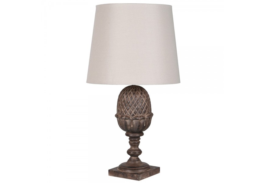 Stylová vintage stolní lampa Egis s kuželovým stínítkem v béžové barvě a dřevěnou vyřezávanou nohou v hnědé barvě s motivem vajíčka