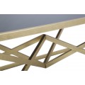 Designový glamour obdélníkový konferenční stolek Triangolo Oro s černou skleněnou deskou a zlatou geometrickou podstavou 110 cm